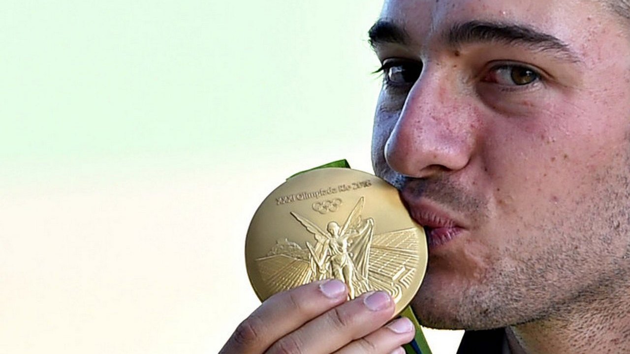 Gabriele Rossetti claims gold in the skeet 24 years after his dad, Bruno, won bronze